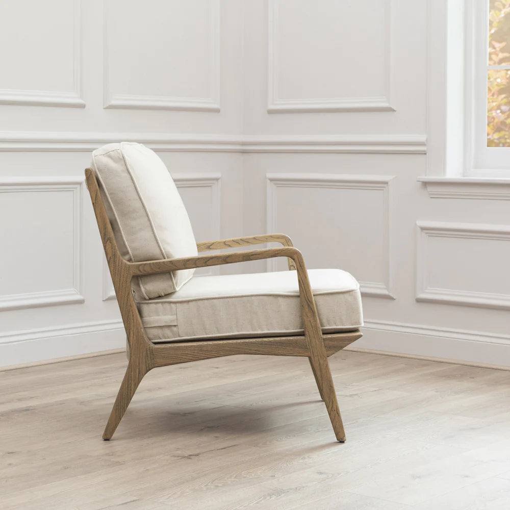 VOYAGE MAISON IDRIS accent chair in natural linen & polished warm wood frame