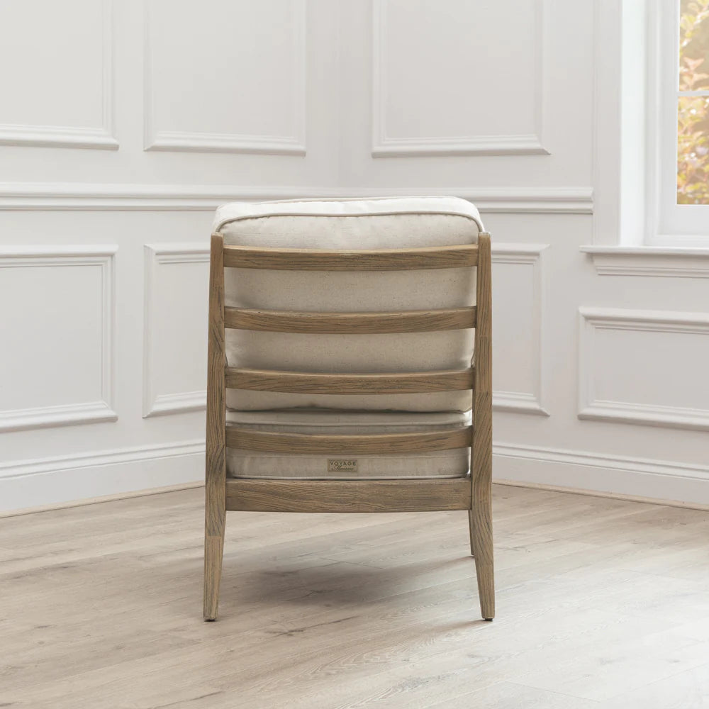 VOYAGE MAISON IDRIS accent chair in natural linen & polished warm wood frame